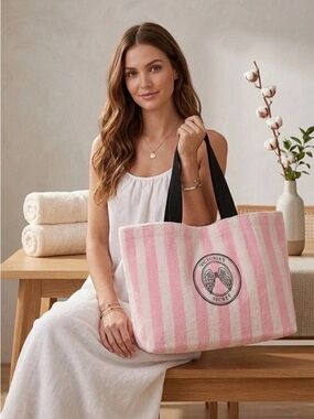 Victoria's Secret~ Angel Traveler
Pink and White Striped Tote
Black Handles
New